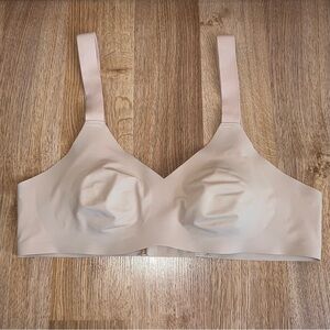 Knix Solid V-neck Wireless Bra 
• Size 2
• Beige nude color